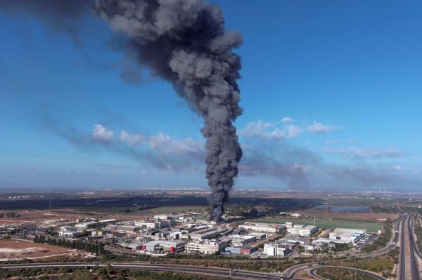 A photo of smoke from rockets being launched from Gaza Saturday.
