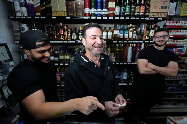 Locals who stopped into Midway Market & Liquor Store Thursday walked in and shook Khalil's hand, congratulating him on the win.